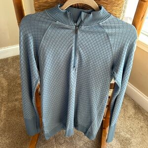 Lululemon blue front zippered top.